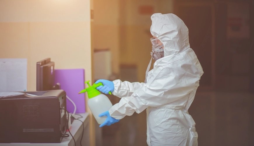 Professional team performing biohazard cleaning in a commercial space