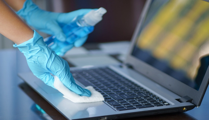 Professional cleaning of office computers and electronics